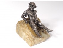 silvered bronze sculpture child sledding stone twentieth century