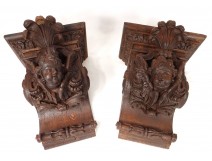 Pair consoles of wooden carved wood heads antifreezes putti foliage XIX